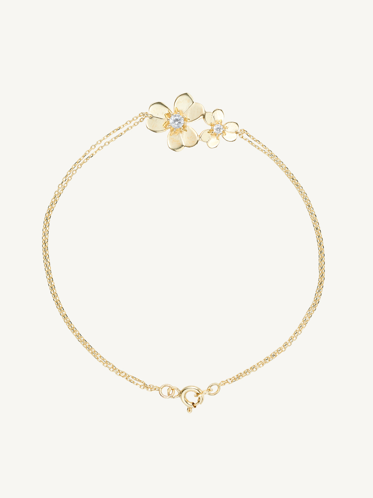 PULSEIRA TREVO COM ZIRCÓNIAS DELICADA FLOR SORTE OURO 9K